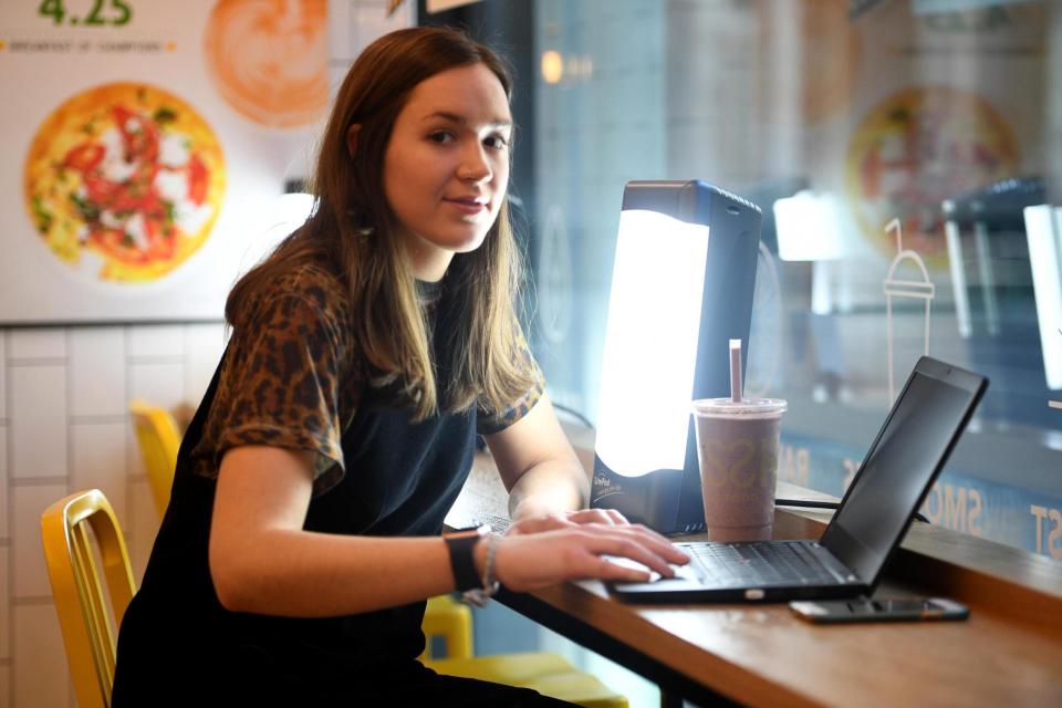 Bright idea: a customer enjoys a smoothie and a few rays at Crussh's Vitamin D Bar: Jeremy Selwyn