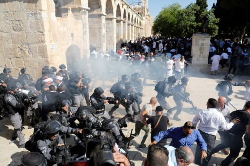 Israeli police fired sound grenades as Palestinian protests intensified at the flashpoint holy site in Jerusalem