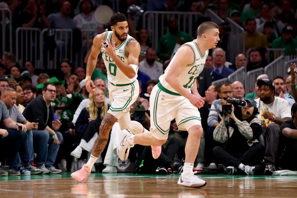 BOSTON, MASSACHUSETTS - MAY 21: Jayson Tatum #0 of the Boston Celtics reacts after making a basket during the first quarter against the Indiana Pacers in Game One of the Eastern Conference Finals at TD Garden on May 21, 2024 in Boston, Massachusetts. NOTE TO USER: User expressly acknowledges and agrees that, by downloading and or using this photograph, User is consenting to the terms and conditions of the Getty Images License Agreement. (Photo by Maddie Meyer/Getty Images)