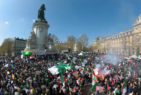 Protestors of the Algerian community of Paris attend a demonstration against President Abdelaziz Bouteflika on the Place de la Republique in Paris, France, March 31, 2019. REUTERS/Charles Platiau
