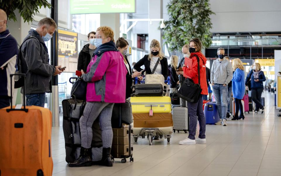 Travellers have been told to expect long waits at the airport this summer - Getty