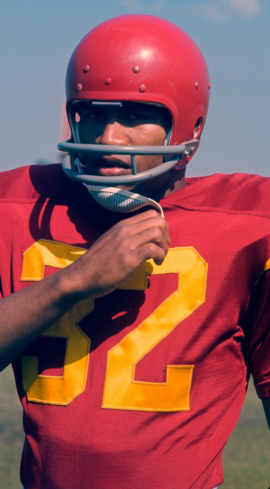 PHOTO: O.J. Simpson #32 of the University of Southern California Trojans looks on from the sidelines during an NCAA college football game circa 1968. (Focus On Sport/Getty Images, FILE)