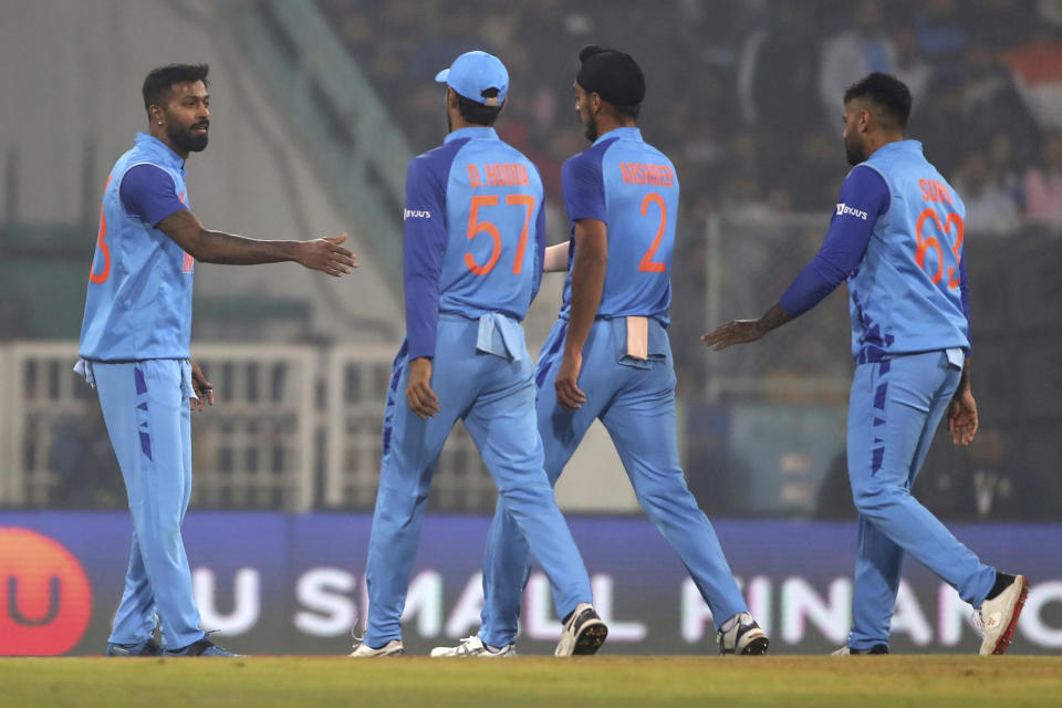 India's captain Hardik Pandya, left, celebrates with teammates after taking the catch to dismiss New Zealand's Ish Sodhi during the second T20 international cricket match between India and New Zealand in Lucknow, India, Sunday, Jan. 29, 2023. (AP Photo/Surjeet Yadav)