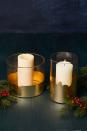 <p>Transform simple white candles holders with gold leaf sheets. You can apply the sheets in a pattern or go for something that feels organic and a bit distressed for that rustic feel. </p><p><a href="https://www.goodhousekeeping.com/holidays/christmas-ideas/how-to/g2203/christmas-decoration-ideas/?slide=5" rel="nofollow noopener" target="_blank" data-ylk="slk:Get the tutorial »" class="link "><em>Get the tutorial »</em></a></p>