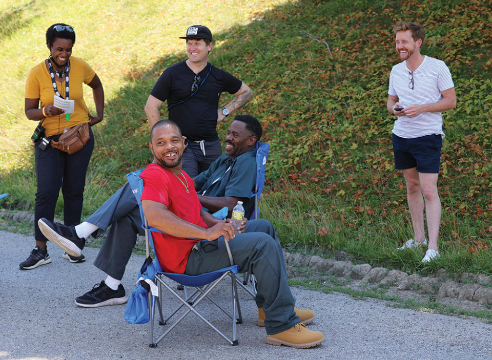 Clarence Maclin (in red) with co-star Colman Domingo (seated) and the filmmakers, plays himself.