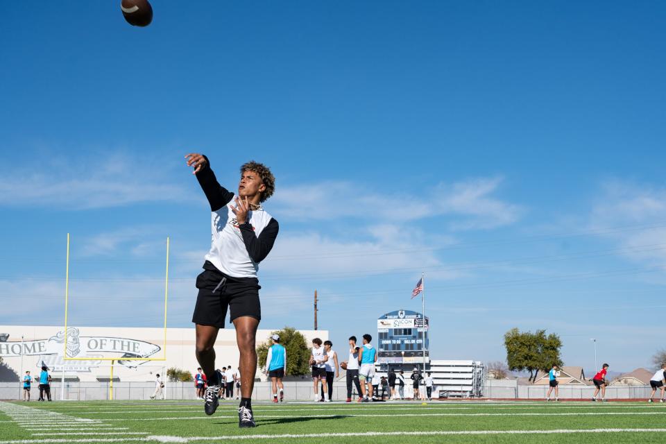 Cactus Shadows' Donivan Dixon throws at the Elev8 Quarterback Academy winter camp at Higley High School on Jan. 6, 2024, in Gilbert.