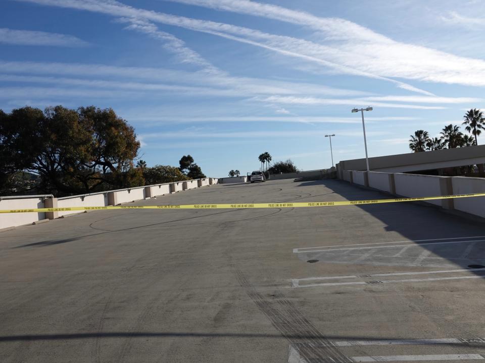 Police tape closes off the top floor of the parking structure on Harbor Boulevard in Ventura after a fatal shooting in January 2020.