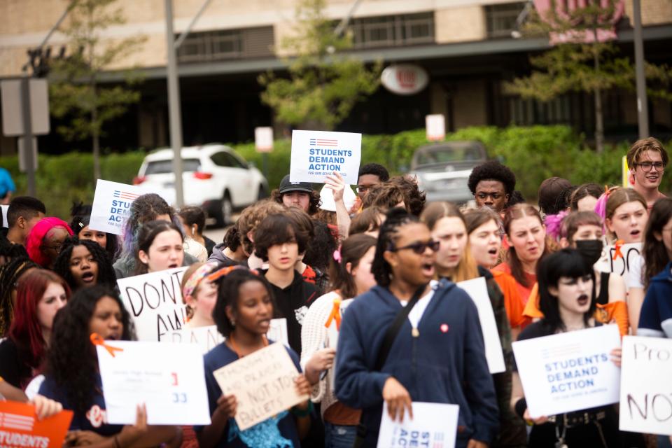 Crosstown High School students walk out of their classes to the outside plaza to protest lax gun laws in Tennessee and across the U.S. on Wednesday in Memphis, Tenn.