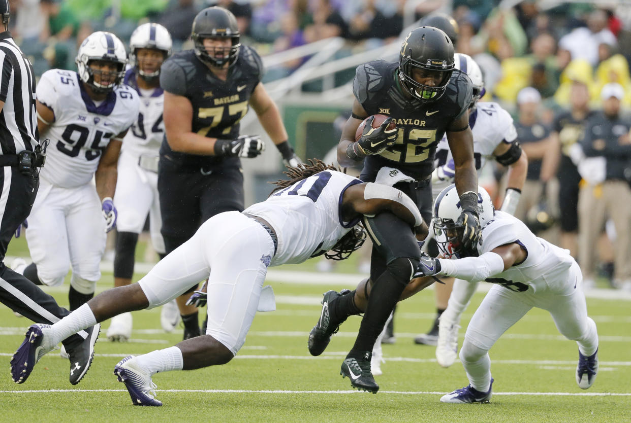 Terence Williams (22) rushed for 1,859 yards and 15 touchdowns in three years at Baylor. (AP Photo/Tony Gutierrez, File)
