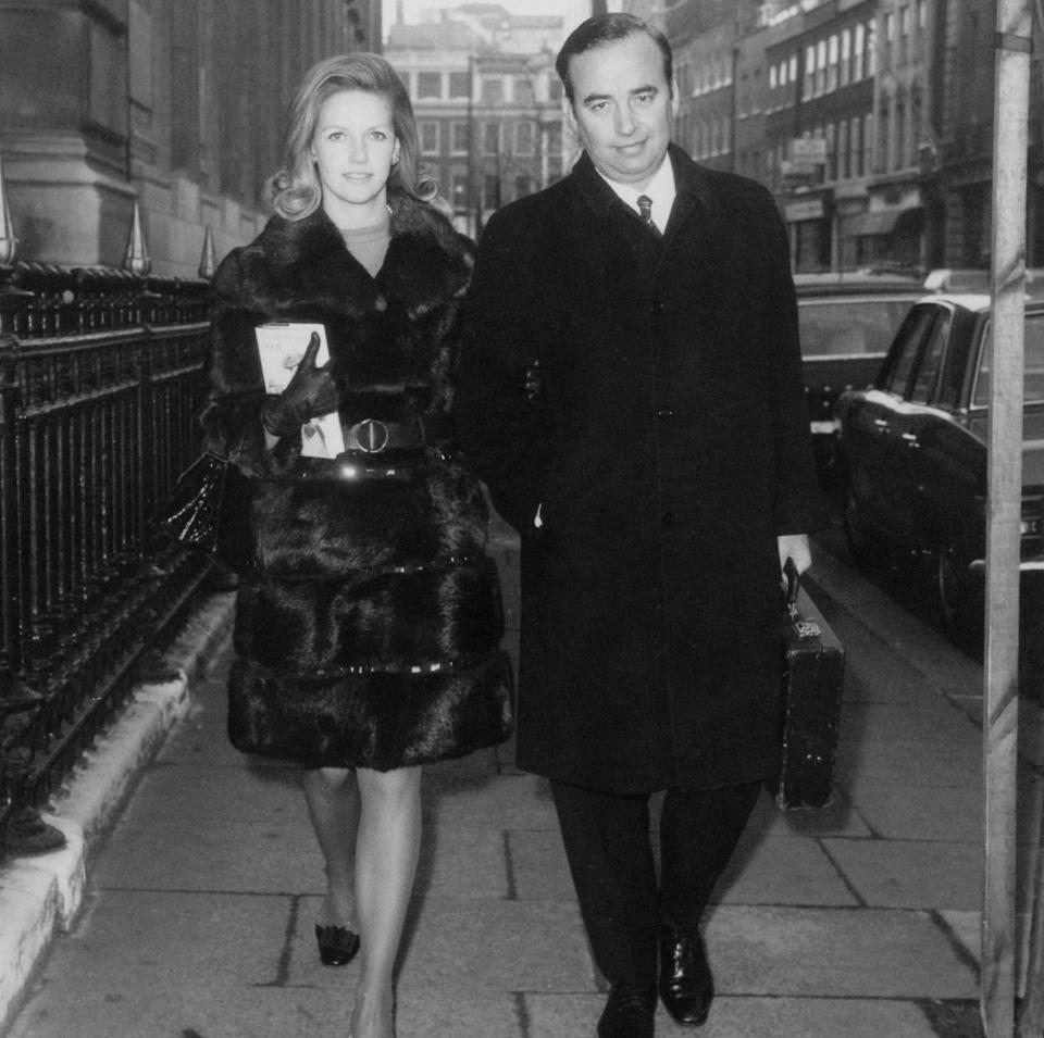 Rupert Murdoch arrives at the Connaught Rooms with his second wife Anna Torv for a meeting of shareholders at the News Of The World in 1969