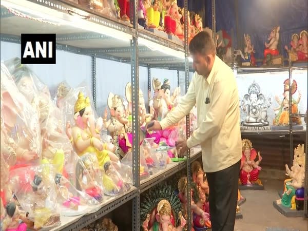 Mumbai's idol maker stacking Ganesh idols (Photo/ANI)