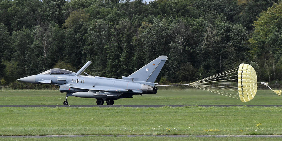 A German Eurofighter does an emergency landing after a flight together with F16 jets from Israels at the airbase in Noervenich, Germany, Thursday, Aug. 20, 2020. Pilots from Israel and Germany will fly together the next two weeks during the first joint military Air Force exercises between the two nations in Germany. (AP Photo/Martin Meissner)