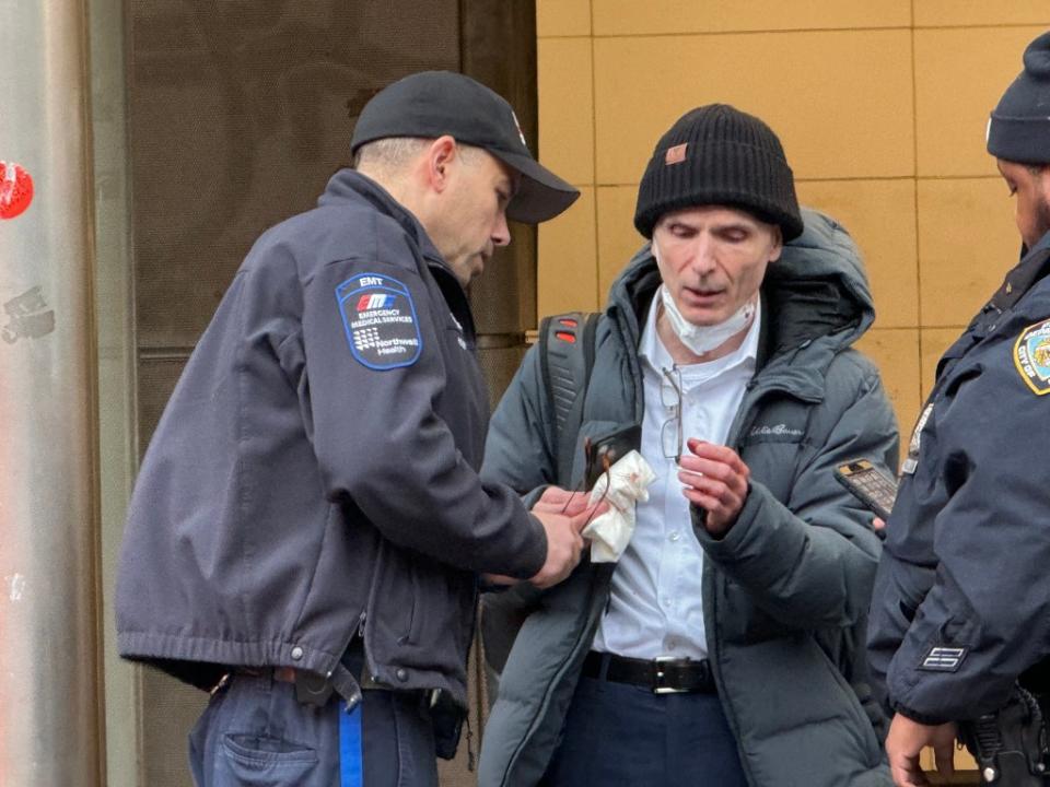 First responders are seen assisting the injured straphanger after the latest series of violent incidents on the subway. Peter Gerber