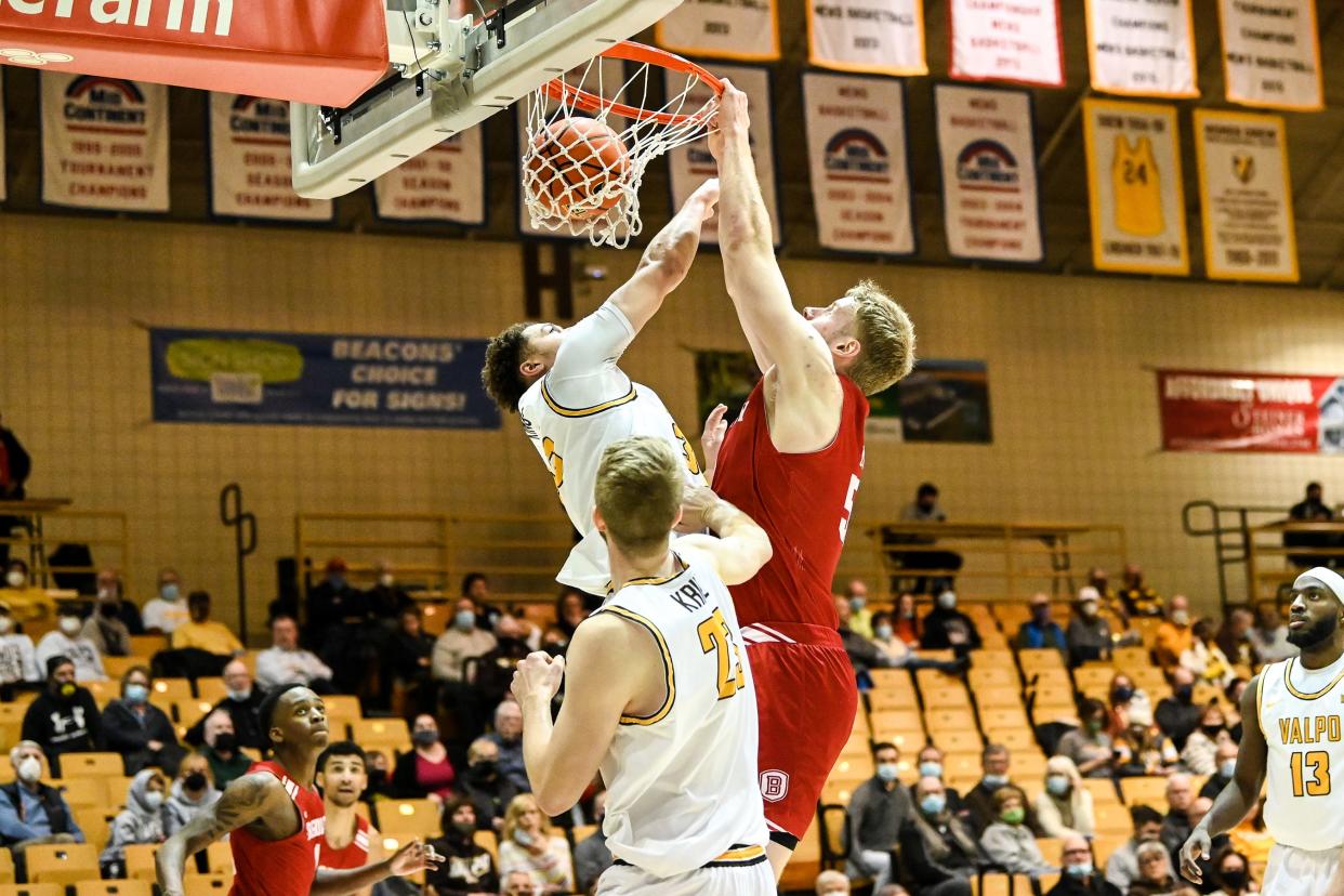 Bradley forward Rienk Mast dunks over a Valparaiso defender during BU's 71-56 victory in an MVC game at Athletics Recreation Center in Valparaiso, Ind., on Jan. 26, 2022.