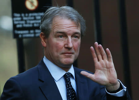 FILE PHOTO: Britain's Environment Secretary Owen Paterson arrives on Downing Street in London February 4, 2014. REUTERS/Suzanne Plunkett/File Photo