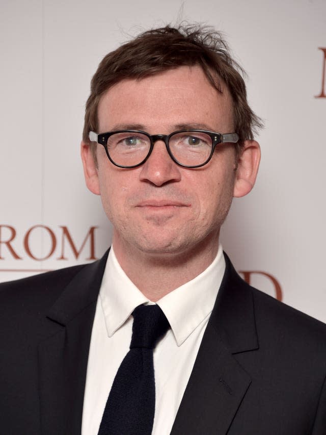 Head shot of a man with glasses