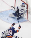 New York Islanders' Brock Nelson (29) celebrates his goal on Tampa Bay Lightning goalie Andrei Vasilevskiy (88) during the third period of Game 3 of the NHL hockey Eastern Conference final, Friday, Sept. 11, 2020, in Edmonton, Alberta. (Jason Franson/The Canadian Press via AP)