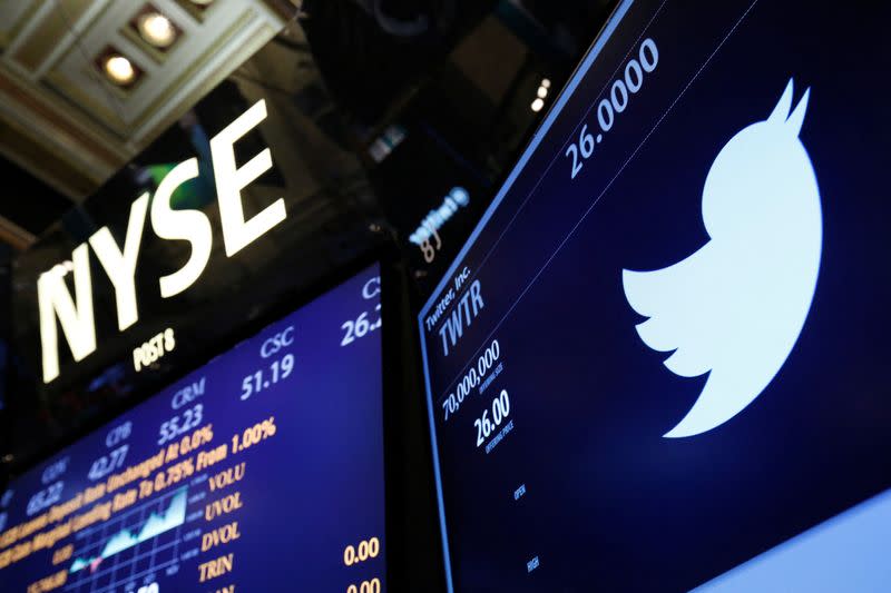 FILE PHOTO: The Twitter logo is seen on the floor before the company's IPO at the New York Stock Exchange in New York