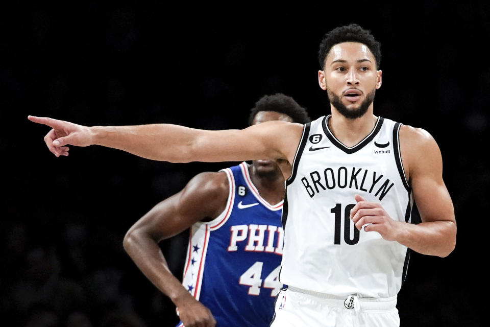 Brooklyn Nets guard Ben Simmons (10) points during the first half of a preseason NBA basketball game against the Philadelphia 76ers, Monday, Oct. 3, 2022, in New York. (AP Photo/Julia Nikhinson)