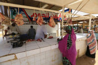 Customers wait to buy meat at a market in Khartoum, Sudan December 2, 2016. REUTERS/Mohamed Nureldin Abdallah