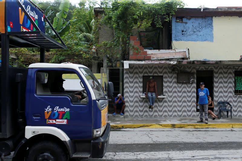 A truck with electoral signs of the Venezuela's united socialist party (PSUV) is seen at a low income neighborhood in La Guaira