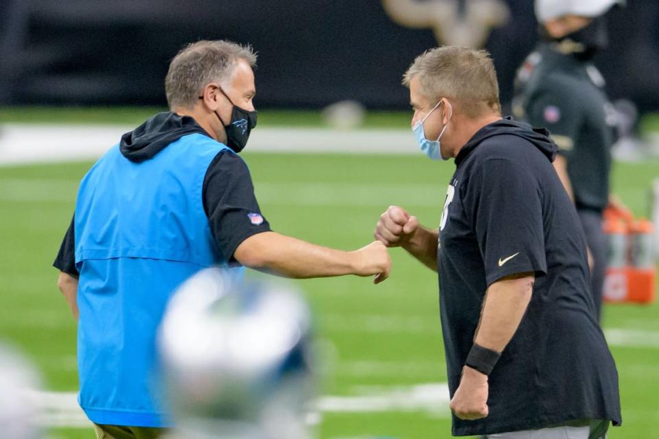 Carolina Panthers head coach Matt Rhule greets New Orleans Saints head coach Sean Payton at the Mercedes-Benz Superdome before a game in October 2020.