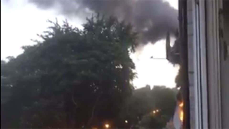 In this footage smoke and flames can be seen coming from inside the flat. Source: Twitter