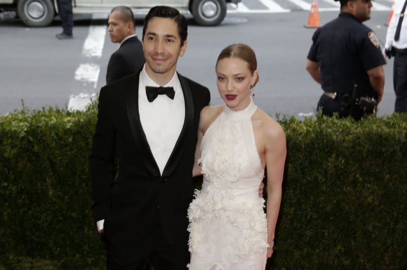 Justin Long and Amanda Seyfried arrive on the red carpet at the Costume Institute Benefit at The Metropolitan Museum of Art celebrating the opening of China: Through the Looking Glass in New York City in 2015. File Photo by John Angelillo/UPI