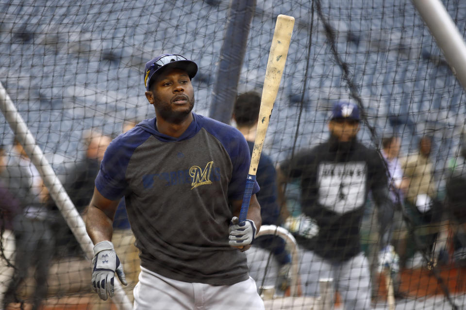 Milwaukee Brewers' Lorenzo Cain takes part in batting practice, Monday, Sept. 30, 2019, in Washington. The Brewers are scheduled to face the Washington Nationals in a National League wild-card baseball game Tuesday, Oct. 1. (AP Photo/Patrick Semansky)