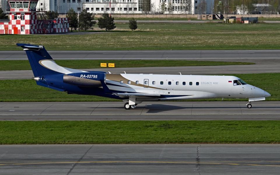 The Embraer Legacy 600 aircraft on the tarmac of the Pulkovo International Airport in Saint Petersburg, Russia, in May