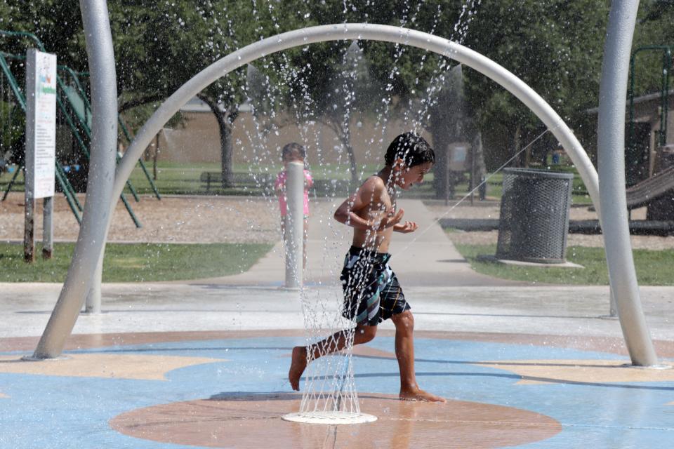 Various fountains at the Memorial Park Splash Pad offer relief from the summer heat, as seen in this 2020 file photo.