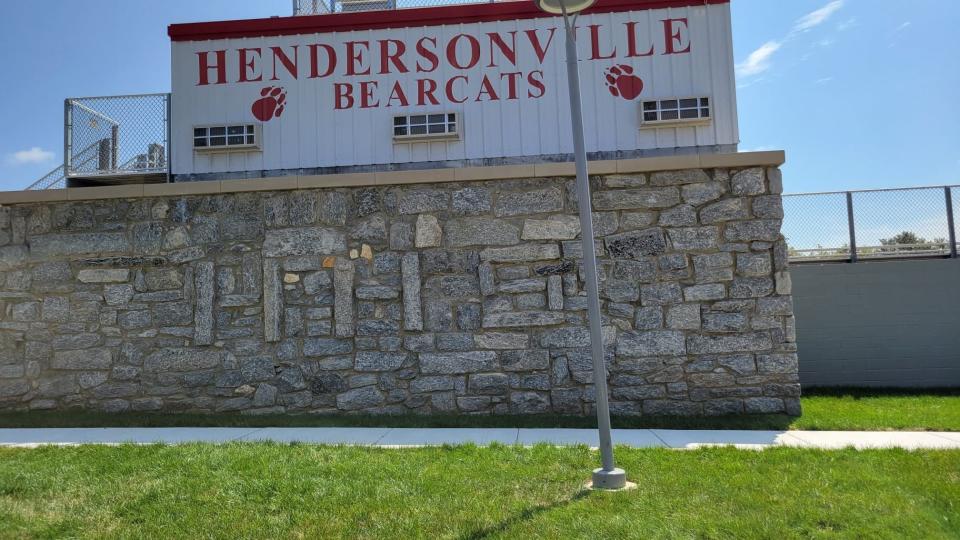 The new press box at Hendersonville High School has the rocks of the old gym as its foundation. Placed in the rocks are the letters HHS.