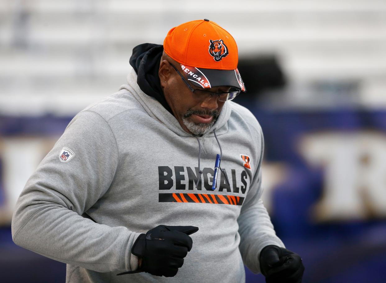 Cincinnati Bengals tight ends coach Jonathan Hayes takes the field before the first quarter of the NFL Week 17 game between the Baltimore Ravens and the Cincinnati Bengals at M&T Bank Stadium in Baltimore on Sunday, Dec. 31, 2017