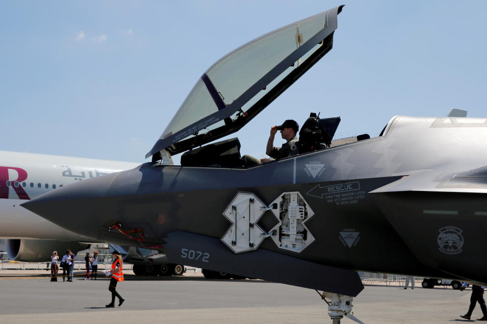 FILE PHOTO: A U.S. soldier adjusts his cap in the cockpit as a Lockheed Martin F-35 Lightning II aircraft is moved on the eve of the 52nd Paris Air Show at Le Bourget Airport near Paris, France, June 18, 2017. REUTERS/Pascal Rossignol/File Photo