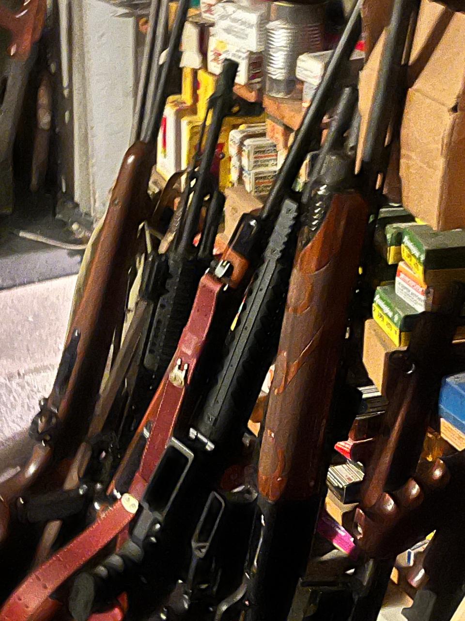 Rifles found in the man's home.