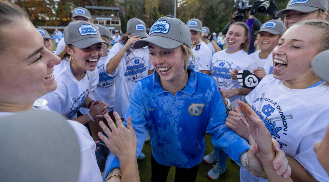 North Carolina field hockey coach Erin Matson celebrates with her team after clinching the 2023 NCAA Division I Field Hockey Championship on Sunday, November 19, 2023 at Karen Shelton Stadium in Chapel Hill, N.C.