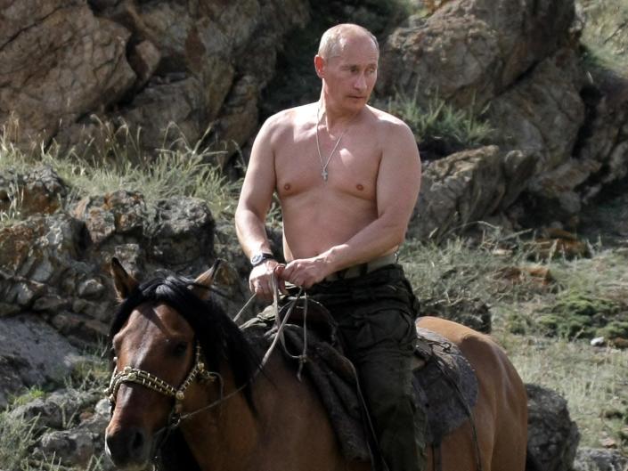 Russian Prime Minister Vladimir Putin rides a horse during his vacation outside the town of Kyzyl in Southern Siberia on August 3, 2009.