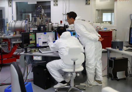 Scientists work in the International Atomic Energy Agency (IAEA) environmental sample laboratory in Seibersdorf, Austria June 13, 2018. Picture taken June 13, 2018. REUTERS/Leonhard Foeger