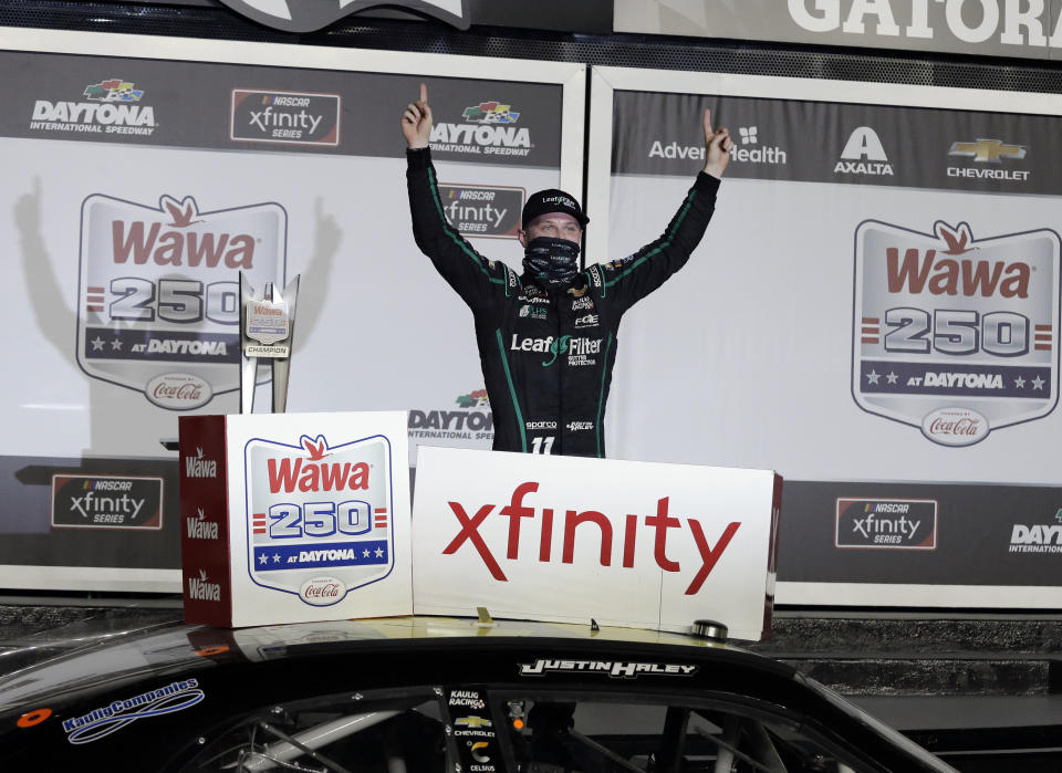 FILE - In this Aug. 28, 2020 file photo, Justin Haley celebrates in Victory Lane after winning a NASCAR Xfinity auto race at Daytona International Speedway in Daytona Beach, Fla. The Xfinity Series prides itself as the “Names Are Made Here” division of NASCAR and it fits this year's playoff class well. (AP Photo/Terry Renna, File)