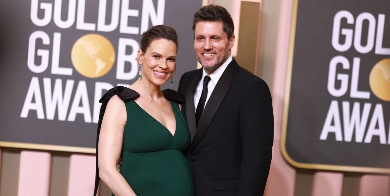 hilary swank, philip schneider, smiling, red carpet