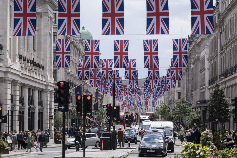 Union Flags hanging high above Regent Street in celebration of Queen Elizabeth II's Platinum Jubilee.