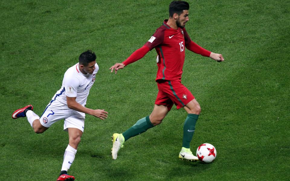 Chile's forward Alexis Sanchez (L) vies with Portugal's midfielder Andre Gomes