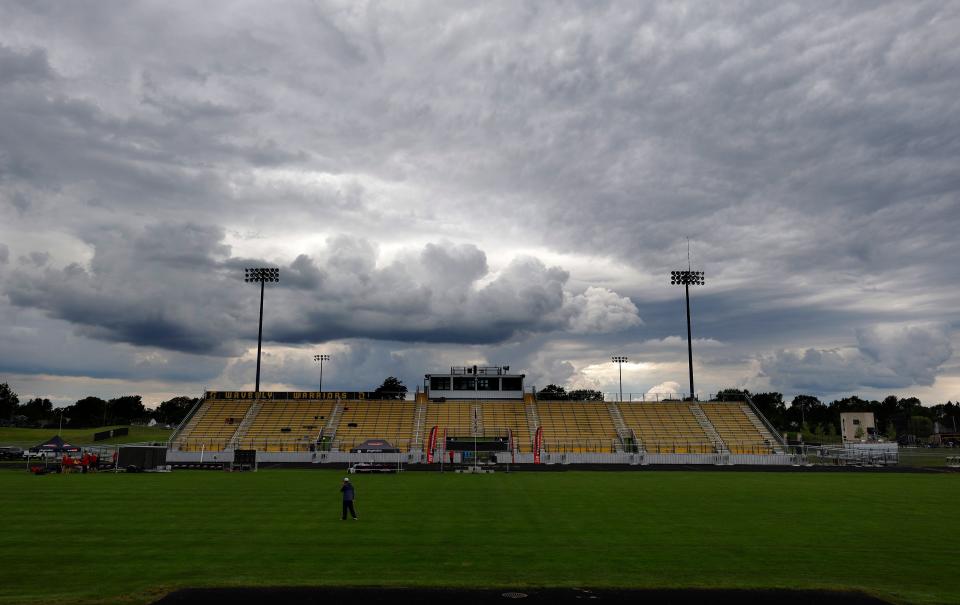 Clouds roll in as weather delays the start of the Honor Roll track meet, Tuesday, May 28, 2024, at Waverly High School. The meet was ultimately canceled.