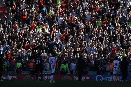 Britain Football Soccer - Stoke City v Liverpool - Premier League - bet365 Stadium - 8/4/17 Liverpool fans celebrate after the match Action Images via Reuters / Carl Recine Livepic