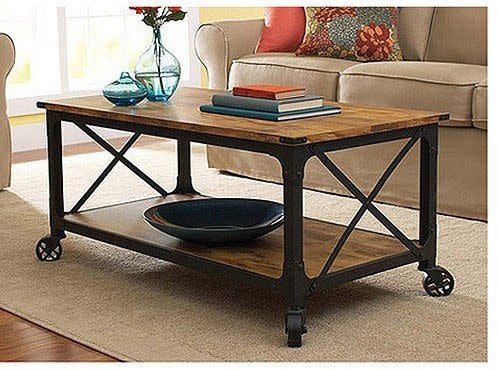 In small spaces, having easily movable furniture is key. We love how <a href="https://jet.com/product/Better-Homes-and-Gardens-Rustic-Country-Coffee-Table-Antiqued-BlackPine-Finish/1e778f4ad97449f09b10981bc78200d4" target="_blank">this coffee table is on wheels</a> making it easy to move around and try out in different places.