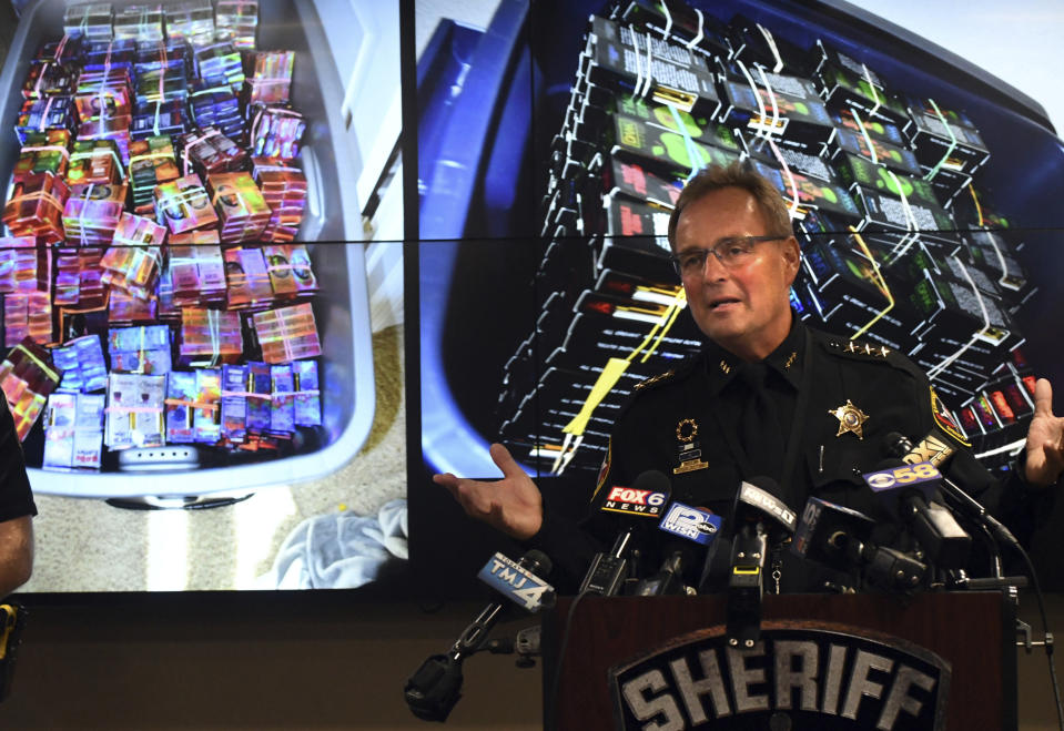 Kenosha County Sheriff David Beth talks about the THC-infused vaping cartridges that were part of a large-scale marijuana operation during a news conference in Kenosha Wednesday, Sept. 11, 2019. (Paul Williams/The Kenosha News via AP)