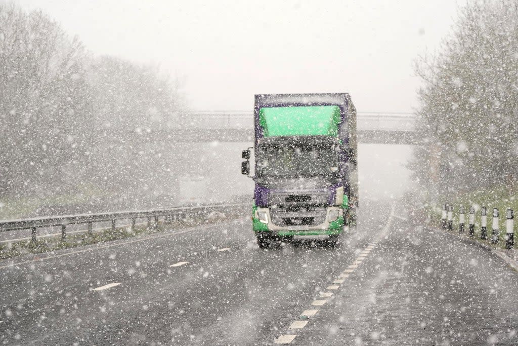 A lorry in snowy conditions on the A69 near Newscastle (Owen Humphreys/PA) (PA Wire)