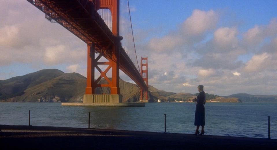 An image from the film <em>Vertigo</em>, by Alfred Hitchcock, with the Golden Gate Bridge in the background. <a href="https://www.imdb.com/title/tt0052357/mediaindex" rel="nofollow noopener" target="_blank" data-ylk="slk:IMDB;elm:context_link;itc:0;sec:content-canvas" class="link ">IMDB</a>