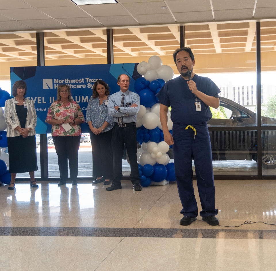 Dr. Yohey Hashimoto, a Texas Tech surgeon and the trauma medical director for Northwest Texas Healthcare System (NWTHS), speaks to staff Thursday at a celebration for NWTHS being named a Level II Trauma Center.