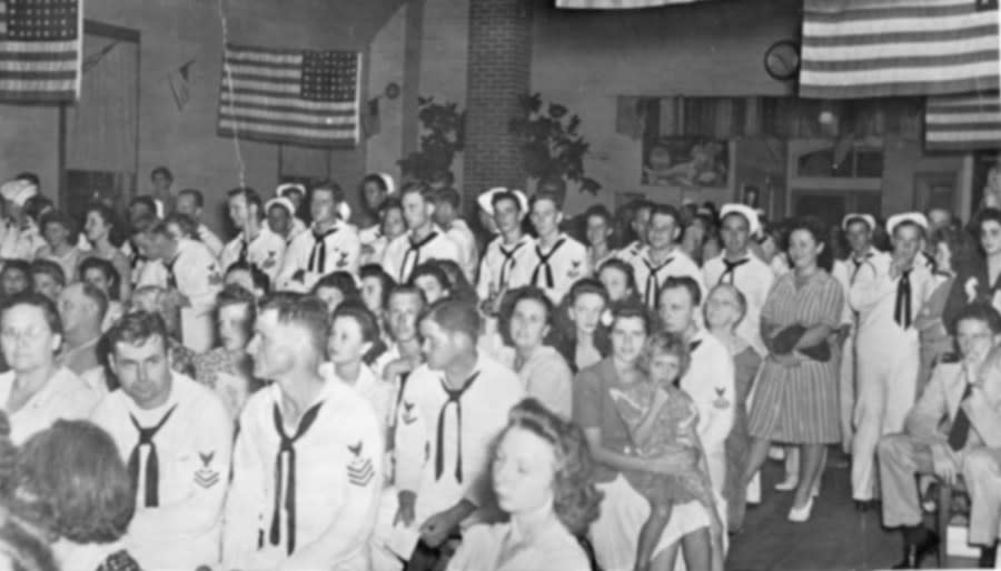 Navy personnel and local residents participate in a USO event in Foley during World War II. The National Park Service named Foley as the American World War II Heritage City for Alabama. (Photo courtesy of the National Park Service)